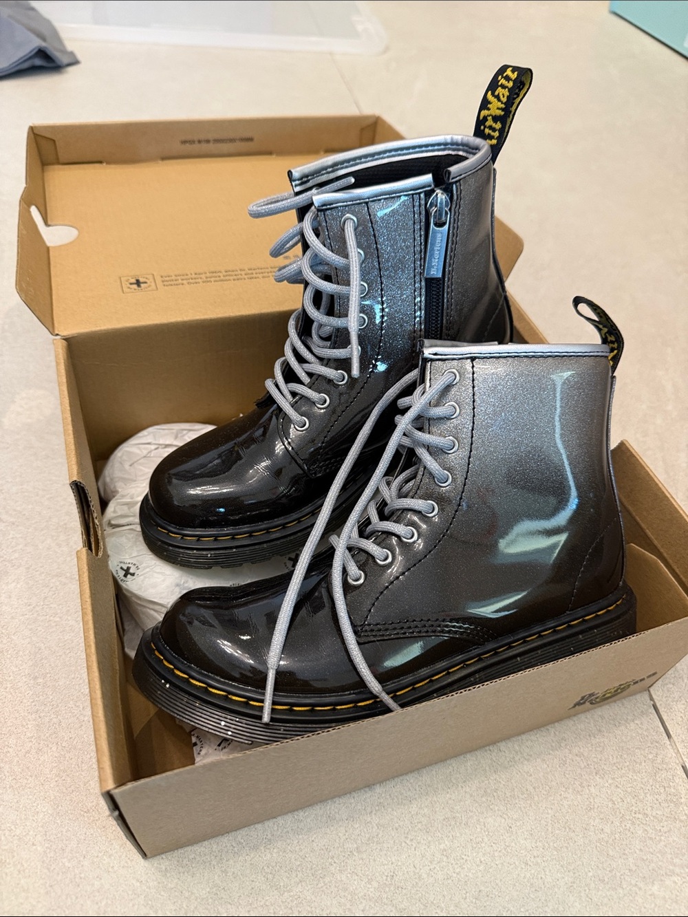 Dr. Martens Black Leather Ankle Boots with Silver Zipper